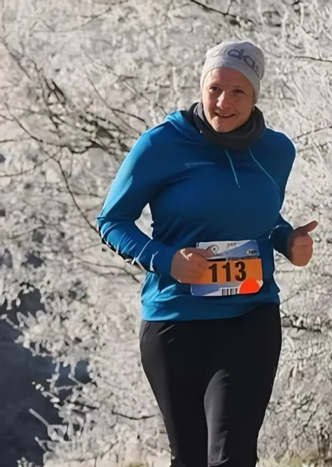 Christina Schilling at a running event in a wintry landscape